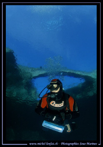My good friend JP diving the Verzasca River - under the b... by Michel Lonfat 
